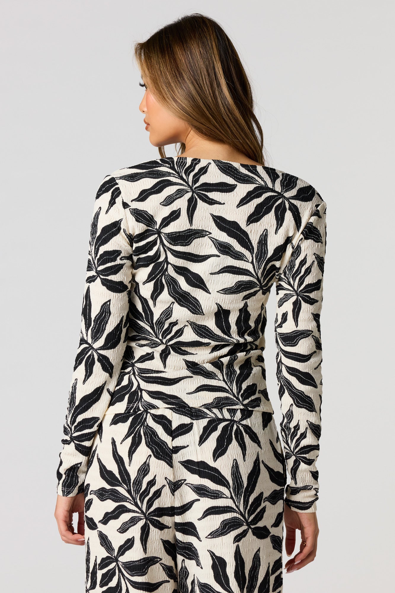Textured Metal Button-Front Long Sleeve Top